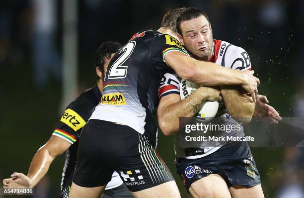 Boyd Cordner of the Roosters is tackled during the round three NRL match between the Penrith Panthers and the Sydney Roosters at Pepper Stadium on...