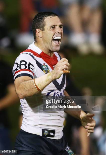 Michael Gordon of the Roosters celebrates scoring a try during the round three NRL match between the Penrith Panthers and the Sydney Roosters at...