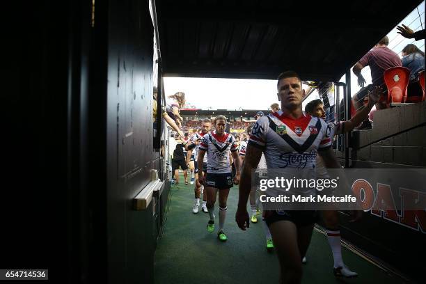 Roosters players walk to the changing room after warm up during the round three NRL match between the Penrith Panthers and the Sydney Roosters at...