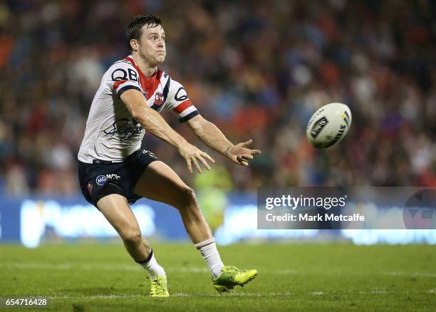 Luke Keary of the Roosters passes the ball during the round three NRL match between the Penrith Panthers and the Sydney Roosters at Pepper Stadium on...