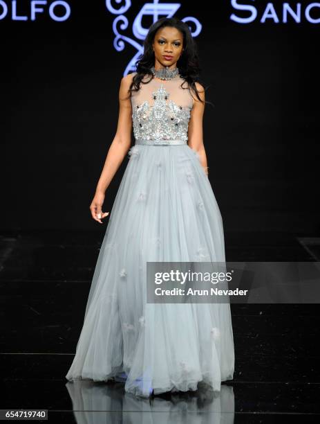 Walks the runway wearing Adolfo Sanchez at Art Hearts Fashion LAFW Fall/Winter 2017 - Day 4 at The Beverly Hilton Hotel on March 17, 2017 in Beverly...