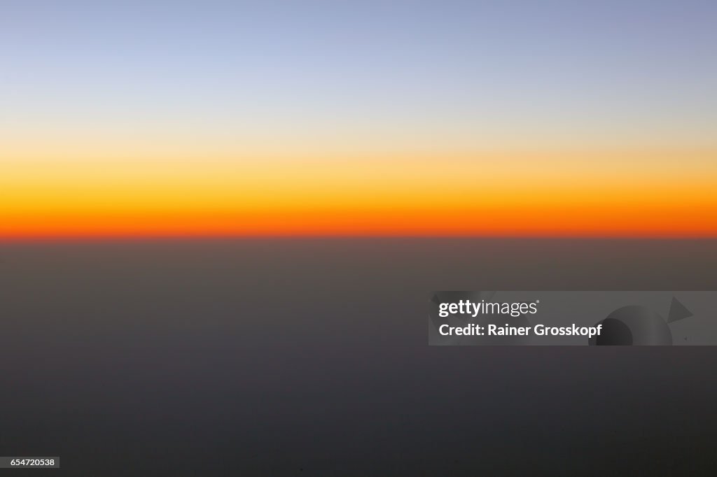 Sunset through an airplane window