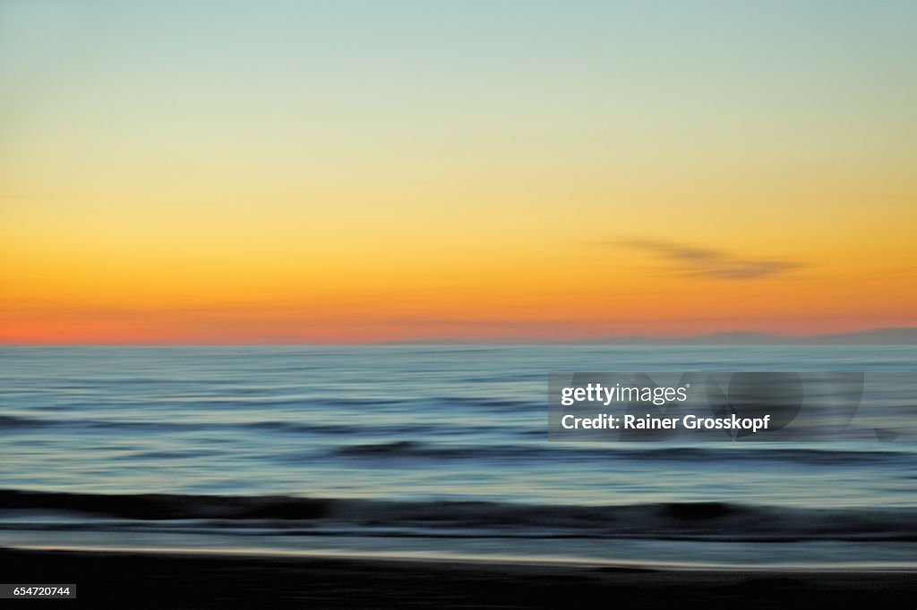 Sunset at Pcific ocean beach (blurred)