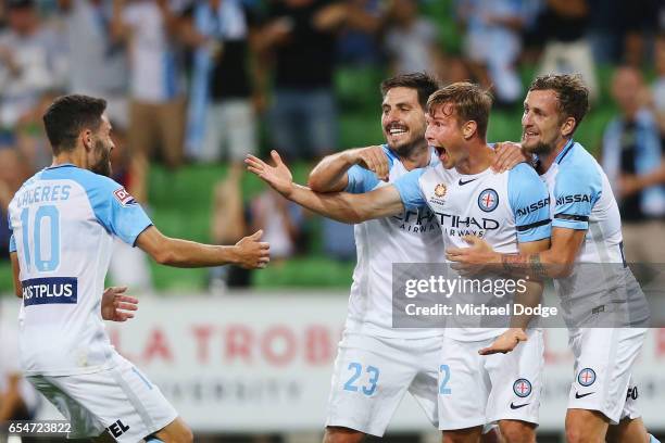 Nicholas Fitzgerald of the City celebrates a goal with Anthony Caceras the City Bruno Fornaroli and Nicholas Colazo during the round 23 A-League...