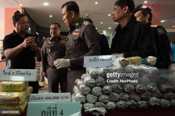 Thai police display seized drugs during a media presentation at their headquarters Bangkok, Thailand, on March 18, 2017. 1 099 tablets of...