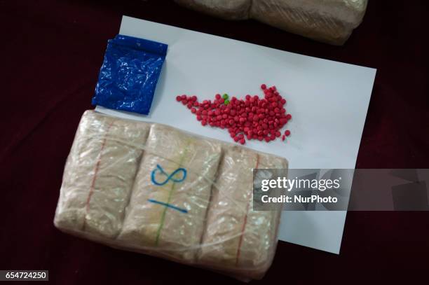 Bags of &quot;yaba&quot; tablets, or methamphetamine mixed with caffeine, are displayed for the media in front of the Narcotics Suppression Division...