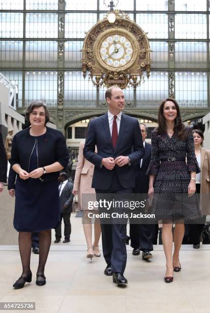 President of the museum Laurence Des Cars shows Prince William, Duke of Cambridge and Catherine, Duchess of Cambridge around at Musee d'Orsay during...