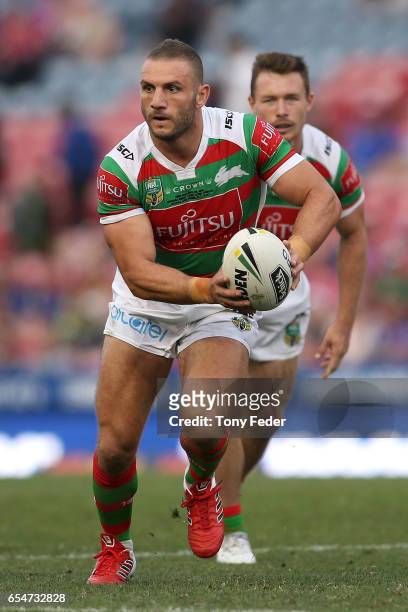 Robbie Farah of the Rabbitohs looks to pass the ball during the round three NRL match between the Newcastle Knights and the South Sydney Rabbitohs at...