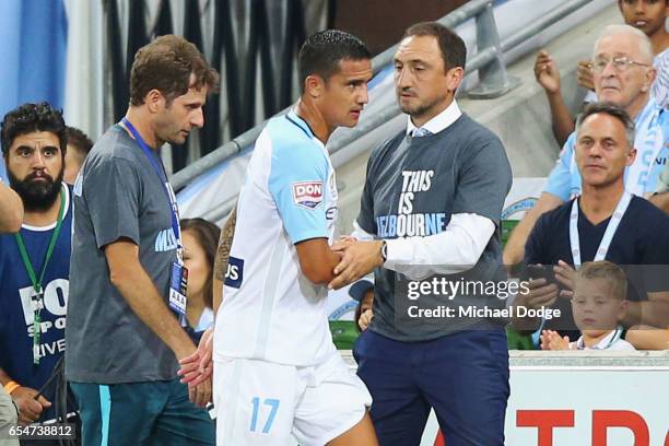 Tim Cahill of the City comes with encouragement from City head coach Michael Valkanis during the round 23 A-League match between Melbourne City FC...