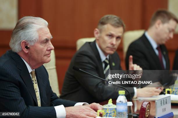 Secretary of State Rex Tillerson meets with China's State Councilor Yang Jiechi at the Diaoyutai State Guesthouse in Beijing on March 18, 2017. The...