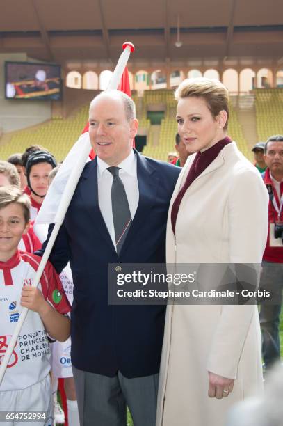 Prince Albert II of Monaco and Princess Charlene of Monaco attend the Sainte Devote Rugby Tournament on March 18, 2017 in Monte-Carlo, Monaco.