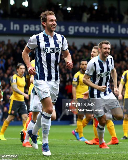 Craig Dawson of West Bromwich Albion celebrates scoring his sides first goal during the Premier League match between West Bromwich Albion and Arsenal...