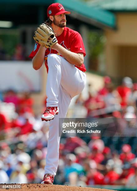 John Gant of the St. Louis Cardinals delivers a pitch in the first inning of a spring training baseball game against the Atalanta Braves at Roger...