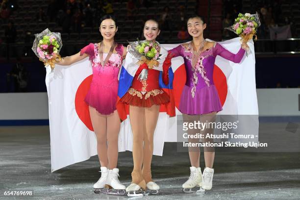 Marin Honda of Japan , Alina Zagitova of Russia and Kaori Sakamoto of Japan pose with their medals during the 4th day of the World Junior Figure...