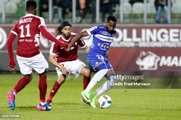 Benoit Assou Ekotto of Metz and Lenny Nangis of Bastia during the Ligue 1 match between Fc Metz and SC Bastia at Stade Saint-Symphorien on March 17,...