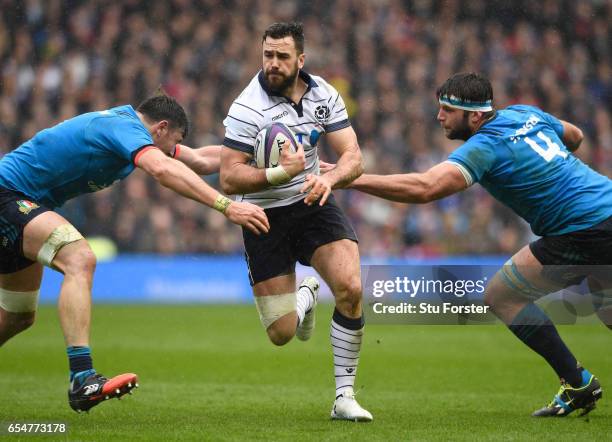 Alex Dunbar of Scotland is tackled by George Biagi of Italy during the RBS Six Nations match between Scotland and Italy at Murrayfield Stadium on...