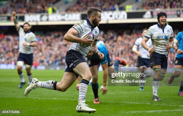 Tommy Seymour of Scotland scores his team's fourth try during the RBS Six Nations match between Scotland and Italy at Murrayfield Stadium on March...