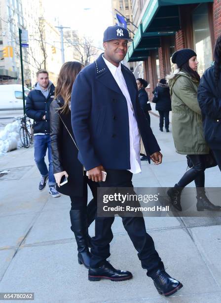 Vincent Herbert is seen walking in Soho on March 17, 2017 in New York City.