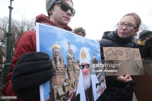 Thousands of peoples stage a demonstration to protest against the transfer of St. Isaac`s Cathedral to the Russian Orthodox Church on the Mars field...