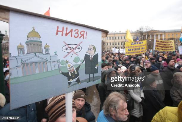 Thousands of peoples stage a demonstration to protest against the transfer of St. Isaac`s Cathedral to the Russian Orthodox Church on the Mars field...