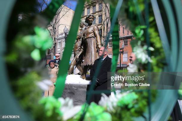 Wreath laying ceremony was held for St. Patrick's Day in downtown Boston at the Boston Irish Famine Memorial, March 17, 2017. A bagpiper played in...