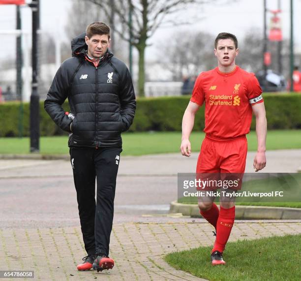 Captain Liam Coyle of Liverpool with Academy Coach Steven Gerrard before the Liverpool v Blackburn Rovers U18 Premier League game at The Kirkby...