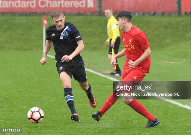 Anthony Glennon of Liverpool and Alex Curran of Blackburn Rovers in action during the Liverpool v Blackburn Rovers U18 Premier League game at The...