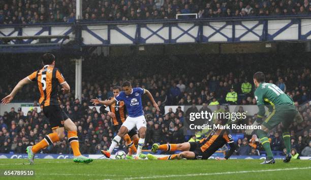 Dominic Calvert-Lewin of Everton scores their first goal during the Premier League match between Everton and Hull City at Goodison Park on March 18,...