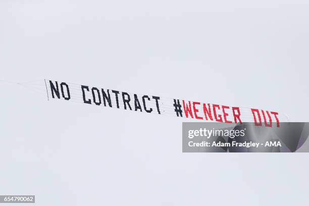 Plane tows a Wenger out banner during the Premier League match between West Bromwich Albion and Arsenal at The Hawthorns on March 18, 2017 in West...