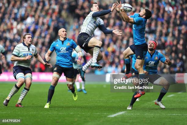 Tim Visser of Scotland vies with Edoardo Padovani of Italy during the RBS Six Nations Championship match between Scotland and Italy at Murrayfield...
