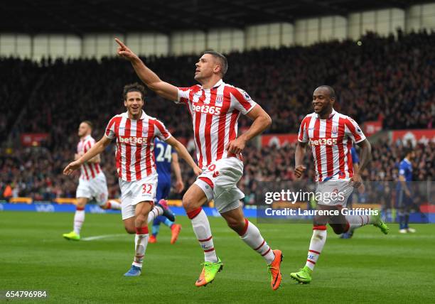 Jonathan Walters of Stoke City celebrates scoring his sides first goal during the Premier League match between Stoke City and Chelsea at Bet365...