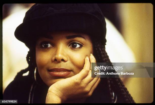 Close-up of American singer and actress Janet Jackson on the set of her film 'Poetic Justice' , 1993.