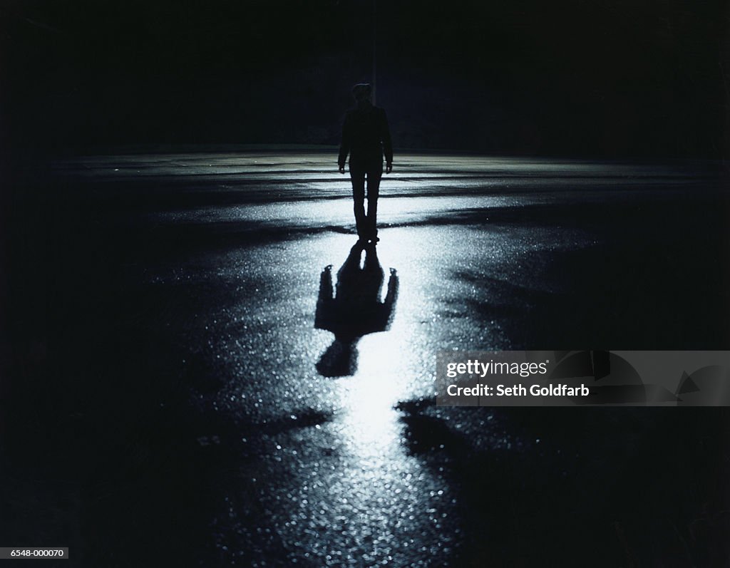 Silhouetted Person at Night