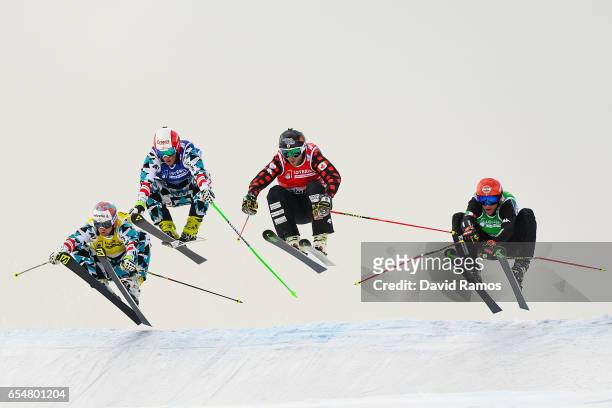 Christoph Wahrstotter of Austria, Adam Kappacher of Austria, Brady Leman of Canada and Siegmar Klotz of Italy compete in the Men's Ski Cross final on...