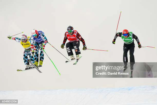 Christoph Wahrstotter of Austria, Adam Kappacher of Austria, Brady Leman of Canada and Siegmar Klotz of Italy compete in the Men's Ski Cross final on...