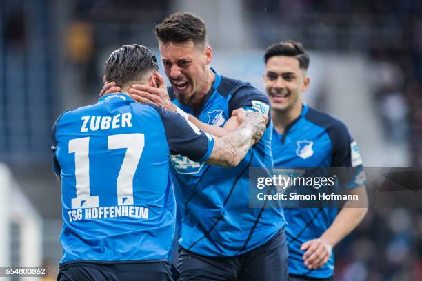 Sandro Wagner and Steven Zuber of Hoffenheim celebrates his team's first goal during the Bundesliga match between TSG 1899 Hoffenheim and Bayer 04...