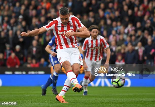 Jonathan Walters of Stoke City scores his sides first goal from the penalty spot during the Premier League match between Stoke City and Chelsea at...