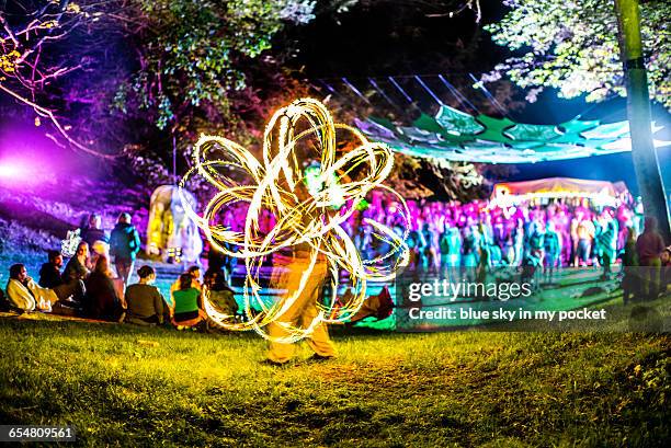 fire dancer - fire dancer stock pictures, royalty-free photos & images