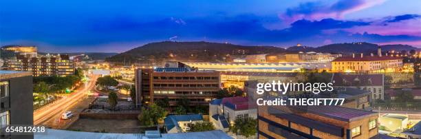 pretoria evening cityscape with unisa and monuments - pretoria stock pictures, royalty-free photos & images