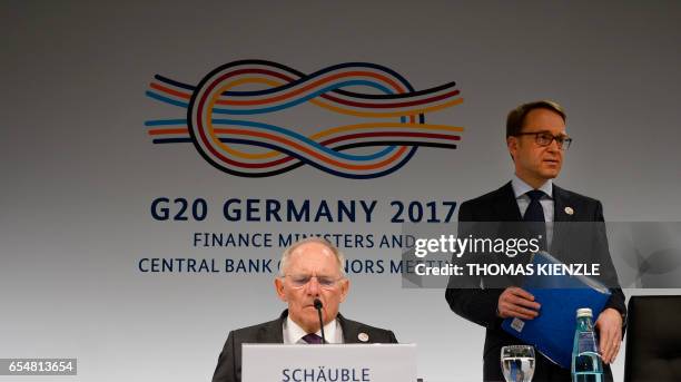 German Finance Minister Wolfgang Schaeuble and president of the German Central Bank Jens Weidmann attend a press conference after the G20 Finance...