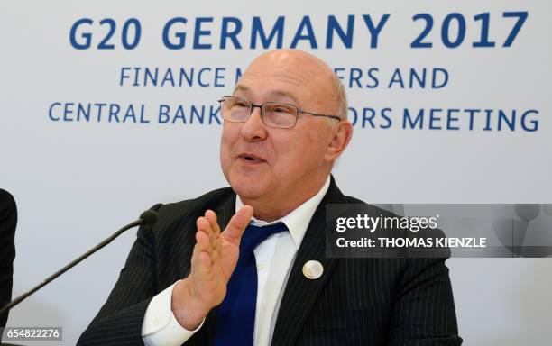 Frances Finance Minister Michel Sapin attends a press conference after the G20 Finance Ministers and Central Bank Governors Meeting in Baden-Baden,...