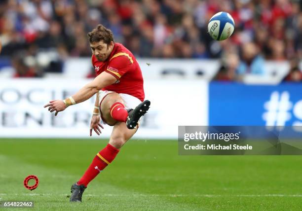 Mike Brown of England kicks a penalty to give his team an 18-13 lead during the RBS Six Nations match between France and Wales at the Stade de France...