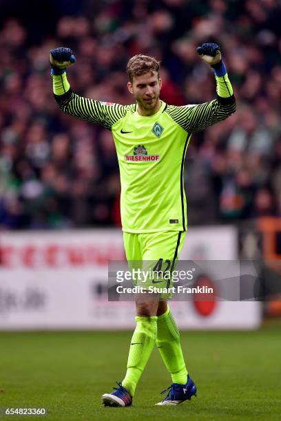 Felix Wiedwald of Bremen celebrates during the Bundesliga match between Werder Bremen and RB Leipzig at Weserstadion on March 18, 2017 in Bremen,...