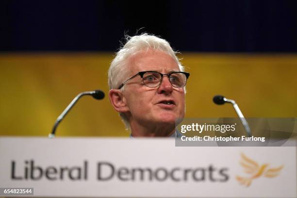 Shadow Health Secretary Norman Lamb addresses delegates on the second day of the Liberal Democrats spring conference at York Barbican on March 18,...