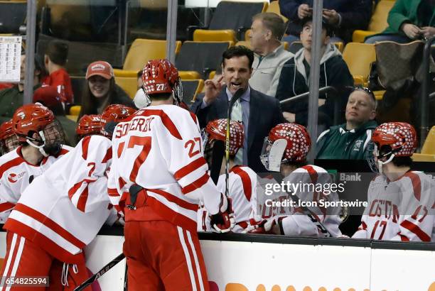 Boston University Terriers head coach David Quinn lectures his players during a time out during a Hockey East semifinal between the Boston University...