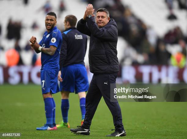 Craig Shakespeare, manager of Leicester City shows appreciation to the fans after the Premier League match between West Ham United and Leicester City...