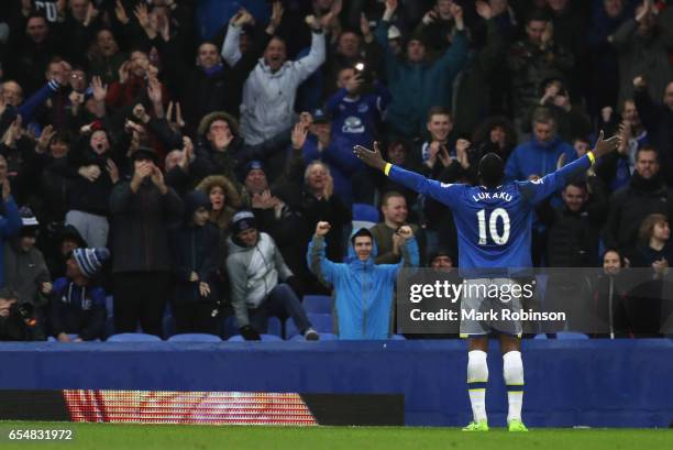Romelu Lukaku of Everton celebrates with fans as he scores their fourth goal during the Premier League match between Everton and Hull City at...