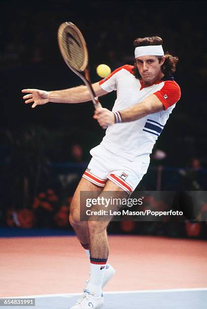 Argentine tennis player Guillermo Vilas pictured in action competing in the Men's Singles tournament at the 1978 Benson & Hedges Championships at...