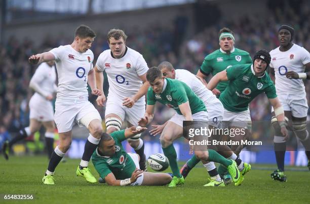 Dublin , Ireland - 18 March 2017; Owen Farrell of England and Simon Zebo and Garry Ringrose of Ireland, right, compete for possession during the RBS...