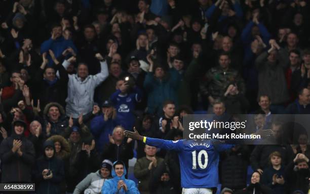 Romelu Lukaku of Everton celebrates with fans as he scores their fourth goal during the Premier League match between Everton and Hull City at...